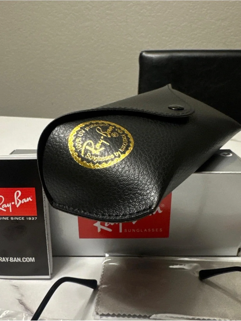Ray-Ban Black Frame Sunglasses with Green Polarized Lenses